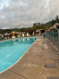 Bazén v ubytování Tacuara Hotel nebo v jeho okolí