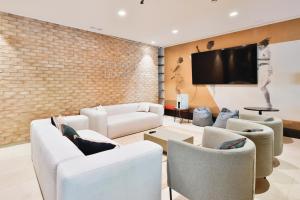 TV a/nebo společenská místnost v ubytování Micampus Pamplona Student Residence