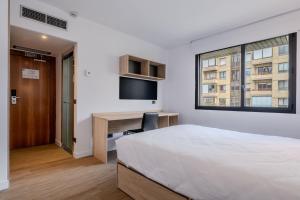 TV a/nebo společenská místnost v ubytování Micampus Pamplona Student Residence