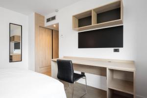TV a/nebo společenská místnost v ubytování Micampus Pamplona Student Residence