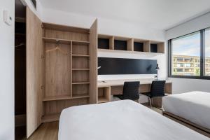 Postel nebo postele na pokoji v ubytování Micampus Pamplona Student Residence