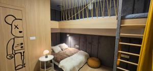 Postel nebo postele na pokoji v ubytování Apartmanica Chalet 5B private wellness, garage, Donovaly