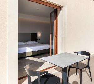 Postelja oz. postelje v sobi nastanitve Hotel Netum Mare