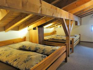 Postel nebo postele na pokoji v ubytování Haus Primula Pizol