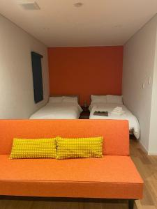 Giường trong phòng chung tại Kanawa Apartment - Vacation STAY 49655v