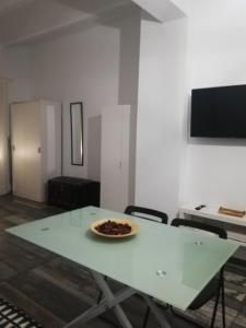 TV a/nebo společenská místnost v ubytování Modernos Apartamentos en Ciudad Jardín Córdoba