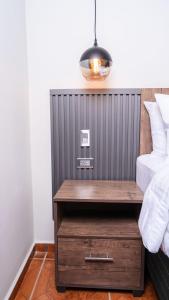 Postel nebo postele na pokoji v ubytování Hotel Boutique Nueva Valladolid