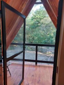 Ein Balkon oder eine Terrasse in der Unterkunft Cabaña El Bosque