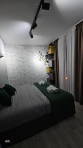 Łóżko lub łóżka w pokoju w obiekcie Superbe appartement dans un quartier neuf et calme