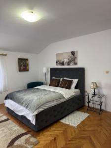 Postel nebo postele na pokoji v ubytování Apartmani Breze