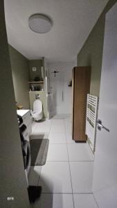 Łazienka w obiekcie Superbe appartement dans un quartier neuf et calme
