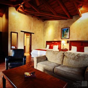 เตียงในห้องที่ Hotel Marina Copan