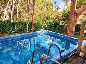 a swimming pool in a yard with at MASIA Del ROC DE SANT CAIETA in Roda de Bará