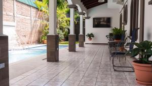 Bazén v ubytování Hotel Boutique Nueva Valladolid nebo v jeho okolí