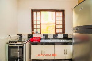 Kuchyň nebo kuchyňský kout v ubytování Casa em Angra dos Reis perto da Praia Jardim