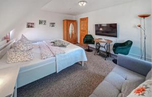 Ένα ή περισσότερα κρεβάτια σε δωμάτιο στο Ferienhaus Plau Am See