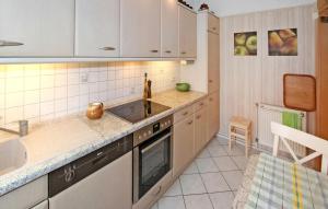 Η κουζίνα ή μικρή κουζίνα στο Ferienhaus Wolgastmahlzow