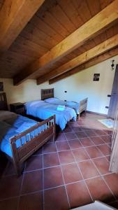Postel nebo postele na pokoji v ubytování Villa Quattro Castagni