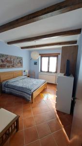 Postel nebo postele na pokoji v ubytování Villa Quattro Castagni