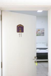 Ένα ή περισσότερα κρεβάτια σε δωμάτιο στο Ivan's guesthouse