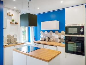 Η κουζίνα ή μικρή κουζίνα στο Kaliyan Appartements 4