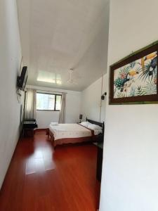 Postel nebo postele na pokoji v ubytování Tacuara Hotel