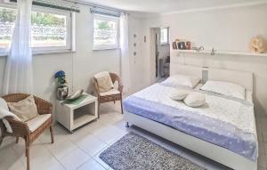 Postel nebo postele na pokoji v ubytování Ferienwohnung Plau Am See + 9 fotografií