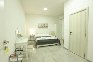 Ένα ή περισσότερα κρεβάτια σε δωμάτιο στο Ivan's guesthouse