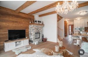 TV a/nebo společenská místnost v ubytování Chalet Rebeca 12 beds Donovaly