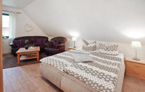 Postel nebo postele na pokoji v ubytování Ferienwohnung Klink + 8 fotografií