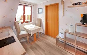 Μια τηλεόραση ή/και κέντρο ψυχαγωγίας στο Ferienwohnung Altenkirchen