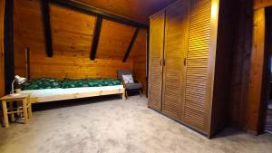Postel nebo postele na pokoji v ubytování Chalupa na lužické stezce