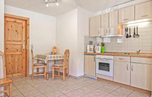 Kuchyň nebo kuchyňský kout v ubytování Ferienwohnung Mönchgut