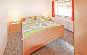 Postel nebo postele na pokoji v ubytování Ferienwohnung Mönchgut