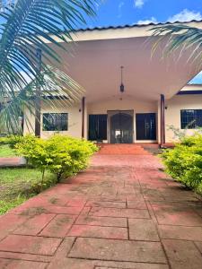 a building with a walkway in front of it at Casa Bella in Esquipulas