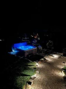 a night view of a swimming pool in the dark at Neverending Story at Eagles Nest in Banner Elk