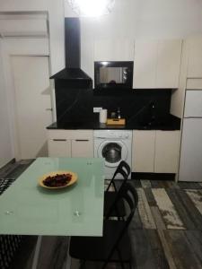 Kuchyň nebo kuchyňský kout v ubytování Modernos Apartamentos en Ciudad Jardín Córdoba