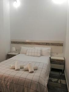 Postel nebo postele na pokoji v ubytování Modernos Apartamentos en Ciudad Jardín Córdoba