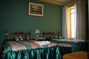 Postel nebo postele na pokoji v ubytování Hotel Las Lineas