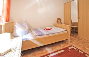 Postel nebo postele na pokoji v ubytování Ferienwohnung Mönchgut
