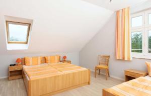 Postel nebo postele na pokoji v ubytování Ferienwohnung Rheinsberg