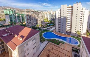 an aerial view of a city with buildings and a pool at Cozy Apartment In Villajoyosa With Wifi in Villajoyosa