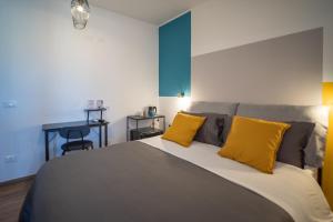 Postel nebo postele na pokoji v ubytování La Terrazza Anagni