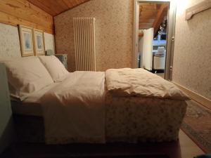 Postel nebo postele na pokoji v ubytování Al piccolo principe