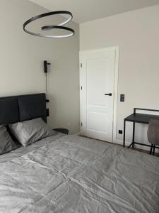 Postel nebo postele na pokoji v ubytování Apartament NP