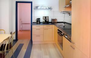 a kitchen with a table and a counter top at Ferienwohnung Pruchten in Pruchten