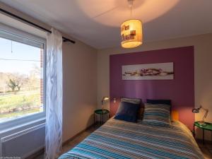 Postel nebo postele na pokoji v ubytování Maison rénovée en bord de Saône, pêche et détente - FR-1-583-300