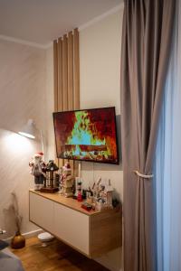 TV a/nebo společenská místnost v ubytování MB APARTMAN TARA