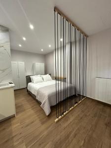 Postel nebo postele na pokoji v ubytování ΝΝ Delphi Loft