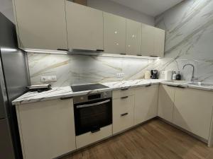 Majoituspaikan ΝΝ Delphi Loft keittiö tai keittotila